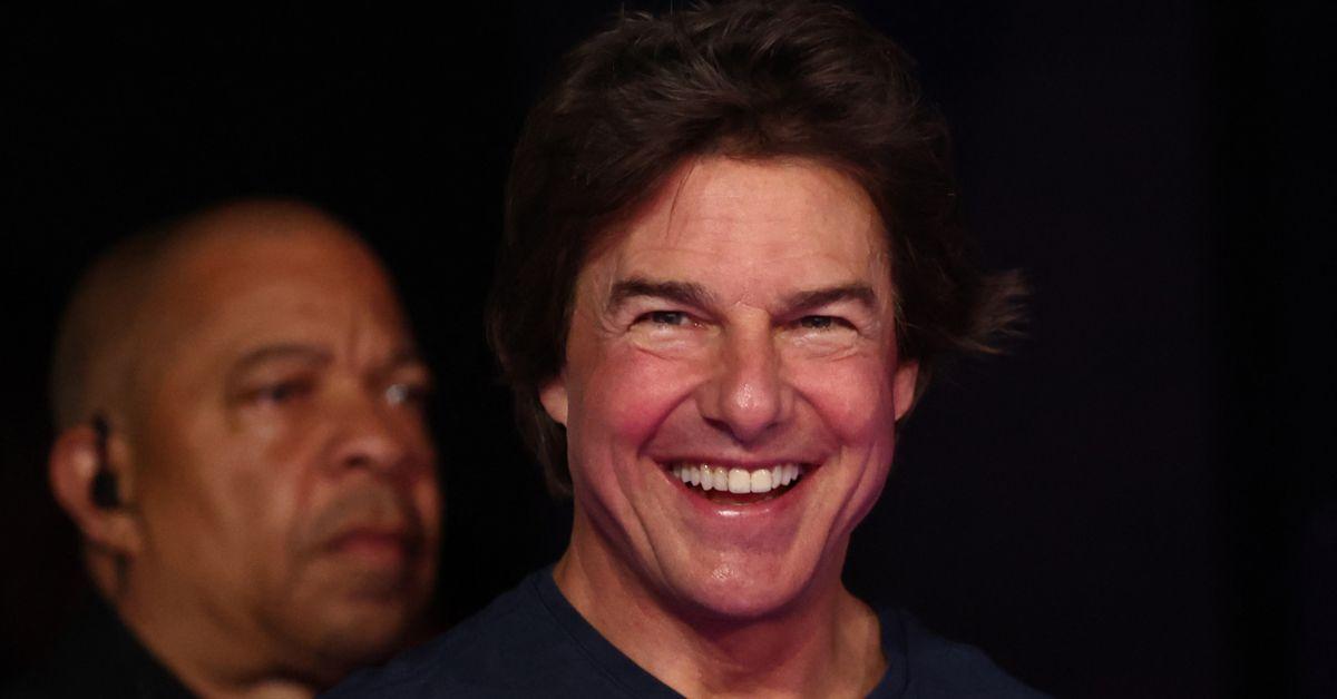 Tom Cruise reacts as he attends the closing ceremony of the Paris 2024 Olympic Games at the Stade de France