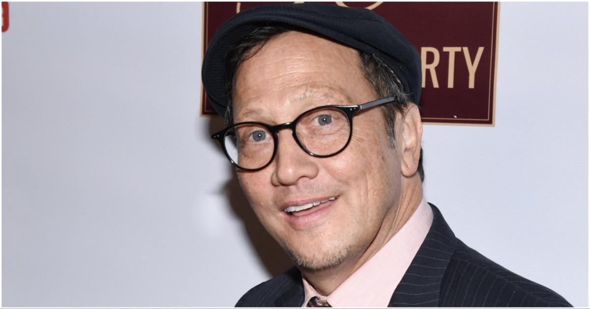 Rob Schneider posing for a press photo