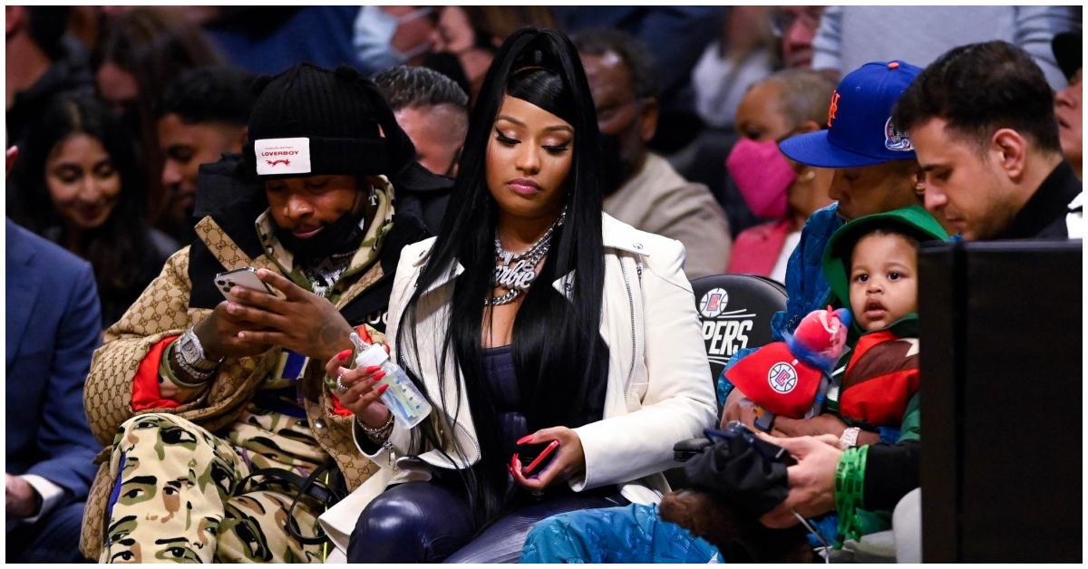 Nicki Minaj and her son, "Papa Bear," and Kenneth Petty.