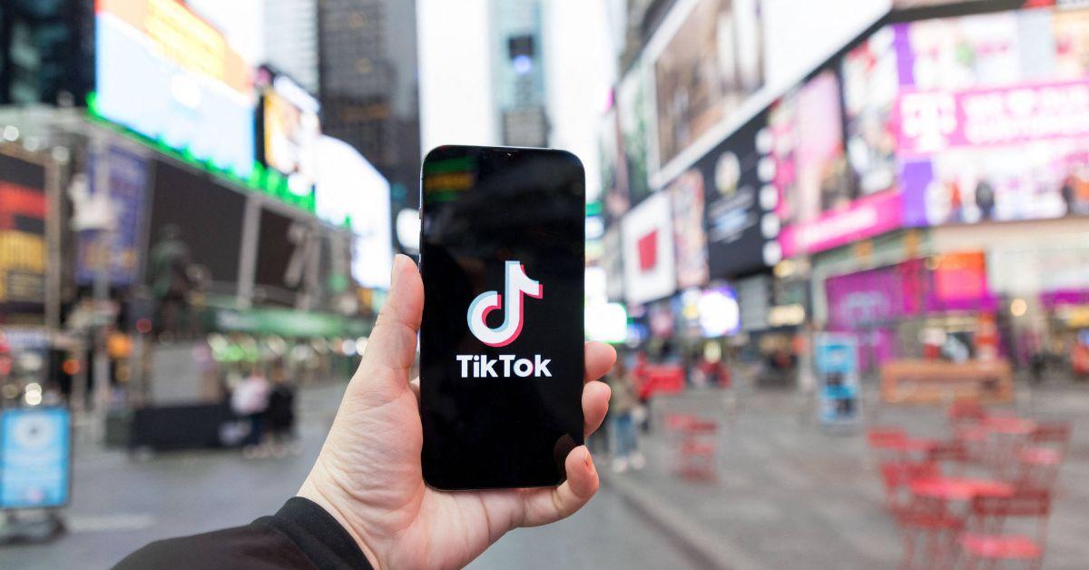 A TikTok logo on a phone in New York City. 