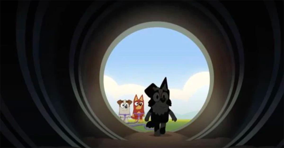 Mackenzie entering a tunnel with Jack and Rusty in the background. 