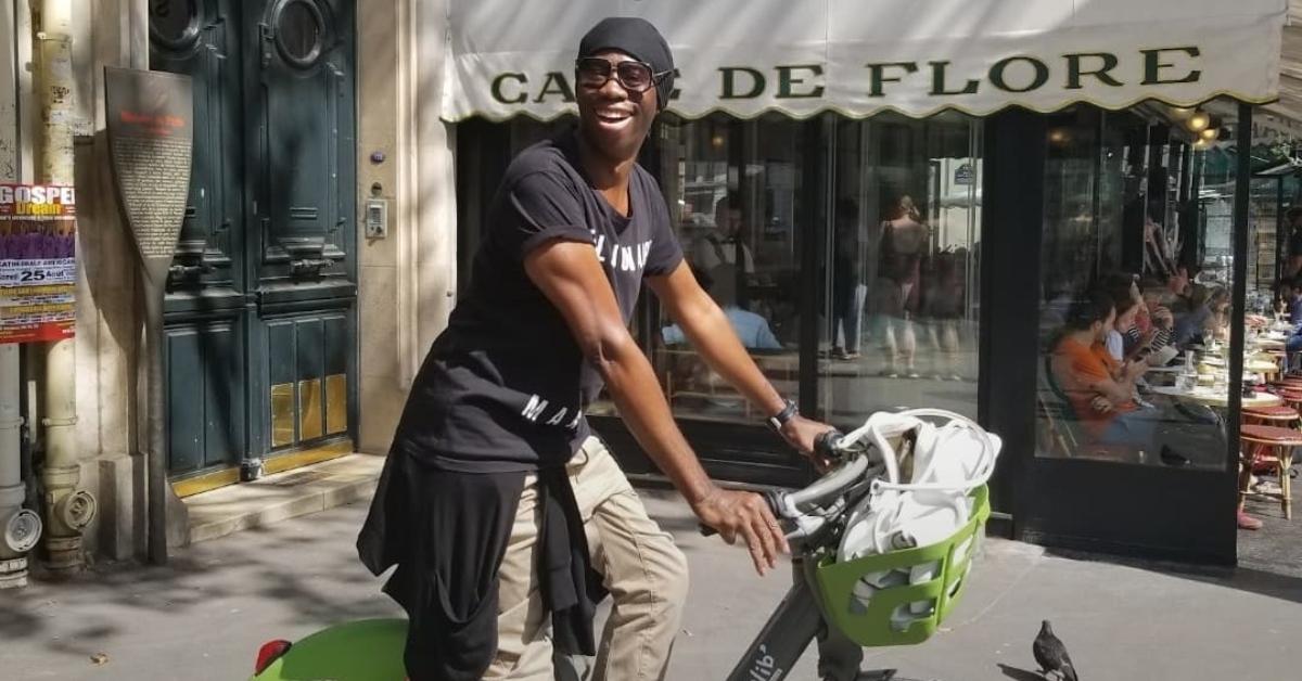 Miss J Alexander on a bike a year before his stroke.