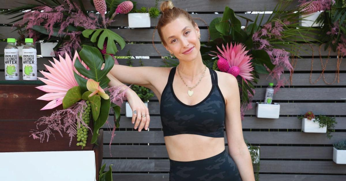 Whitney Port hydrates before a Punch Pedal class at the Montauk Beach House on August 03, 2019 in Montauk, New York.