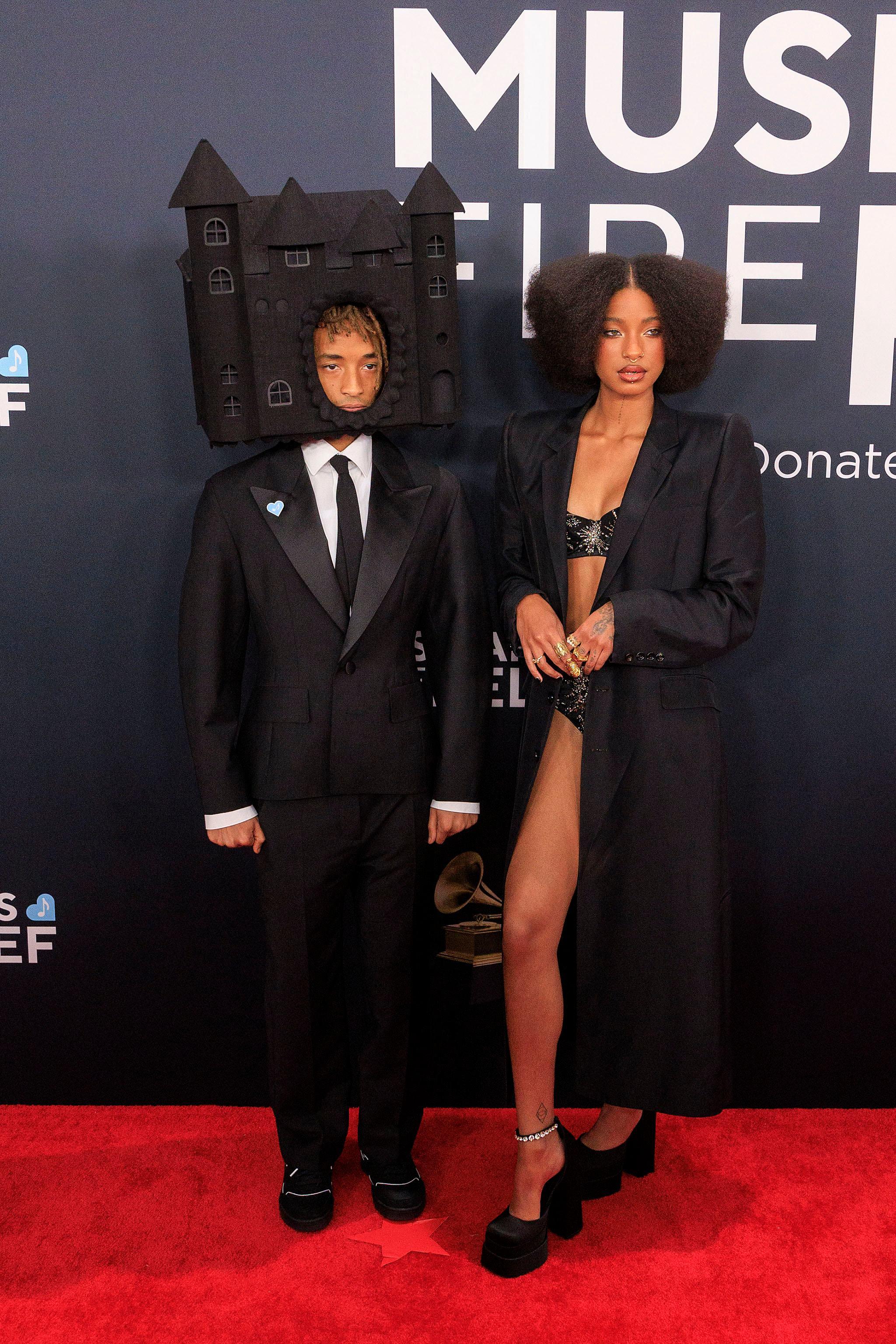 Jayden Smith wearing a house on his head at the 67th Grammy Awards with his sister, Willow Smith.