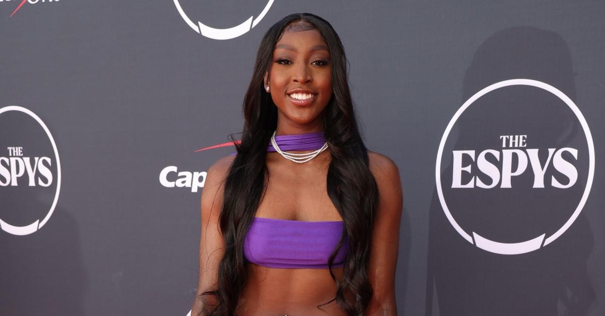 Flau'jae Johnson attends The 2023 ESPY Awards at Dolby Theatre on July 12, 2023 in Hollywood, California wearing a purple dress.