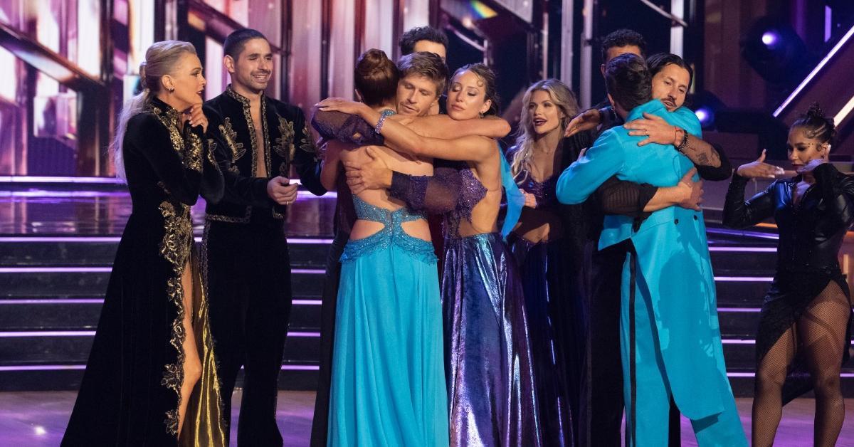 (l-r): Whitney Leavitt and Mark Ballas being supported after their 'DWTS' elimination.