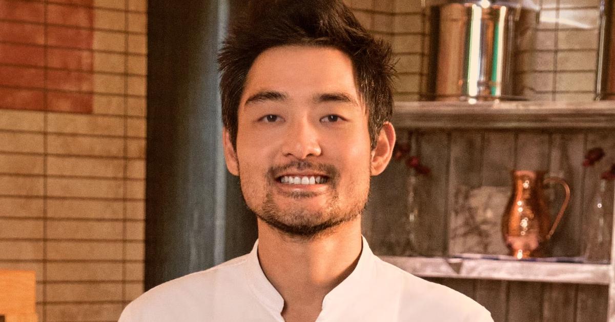 Soo Ahn wears a white chef's jacket for his official 'Top Chef: Wisconsin' portrait.