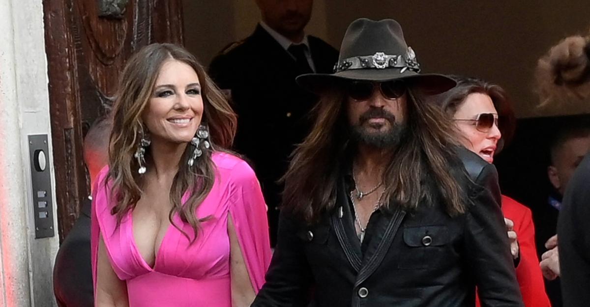 Elizabeth Hurley and Billy Ray Cyrus at the Orizzonti Rosso Exhibition Opening