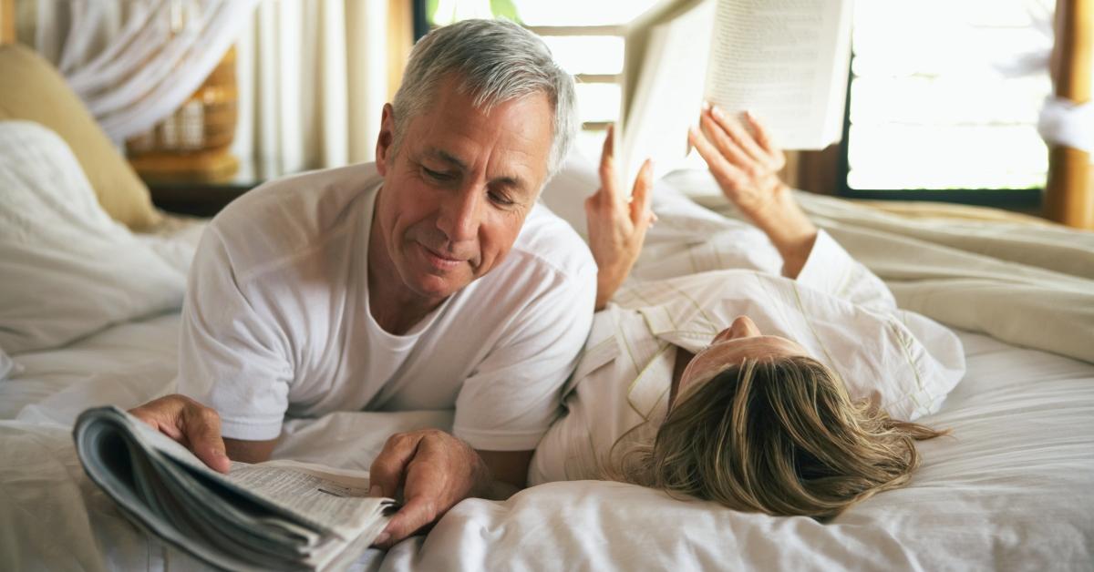 Couple reading in bed