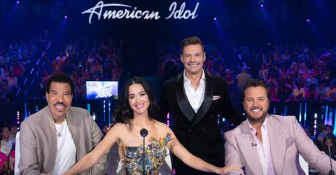 Lionel Richie, Katy Perry, Ryan Seacrest, and Luke Bryan sitting at the judges table on Season 22 of ‘American Idol’.