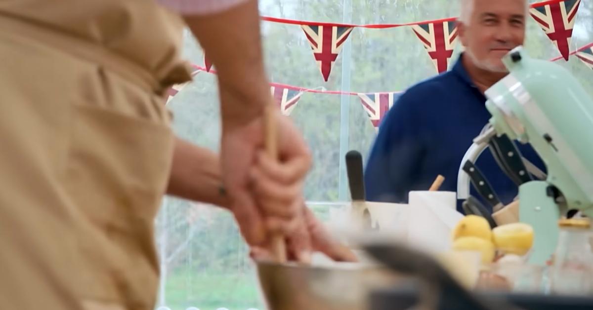 Contestants baking on GBBO