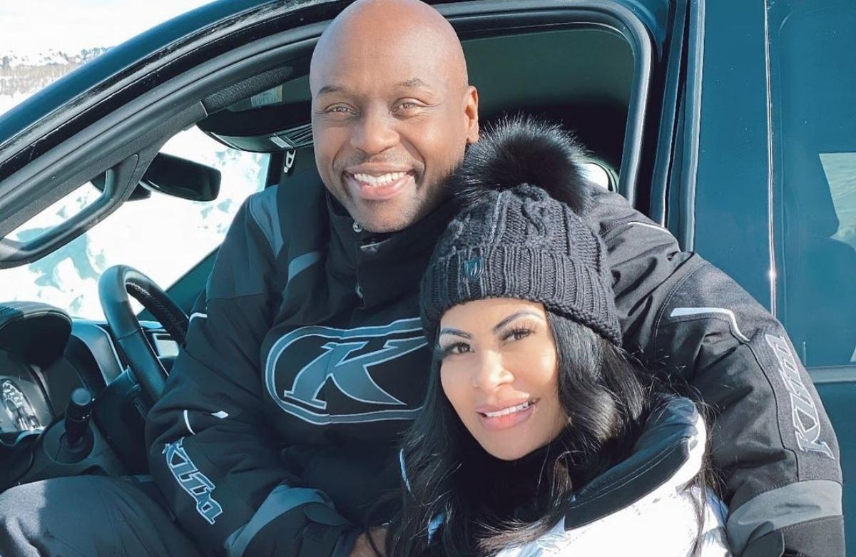 Jen Shah and her husband in a snowmobile