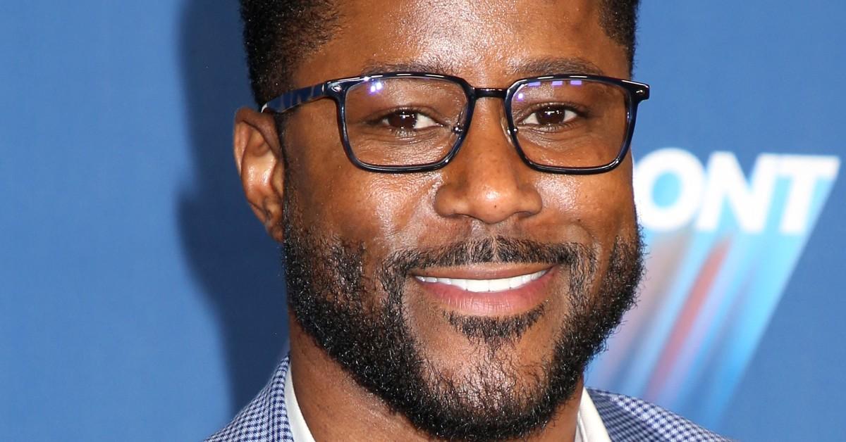 Nate Burleson posing for a press photo