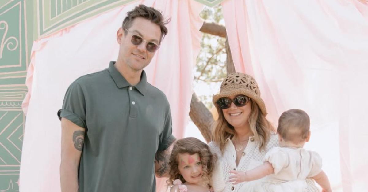 Ashley Tisdale with her husband and their two daughters in March 2025.