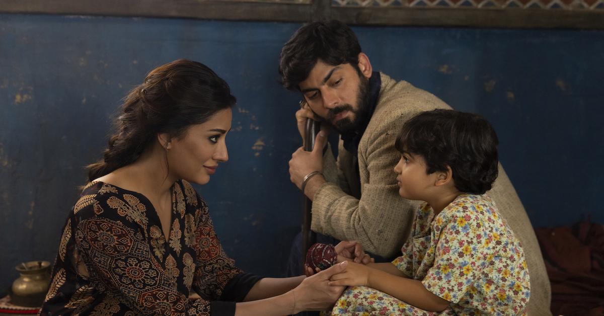 Mehwish Hayat as Aisha, Fawad Kahn as Hasan, and Zion Usman as Young Sana in Marvel Studios' MS. MARVEL