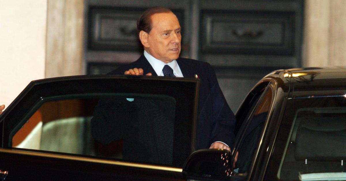 Silvio Berlusconi getting into a car in 2011.