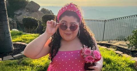 Raini Rodriguez wearing a pink polka dot dress.