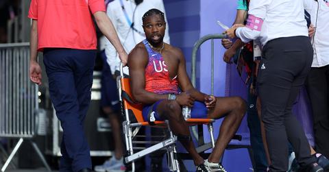 Noah Lyles in a wheelchair after the 200m final.