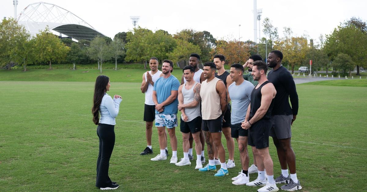 Jenn Tran with some of The Bachelorette contestants on a field