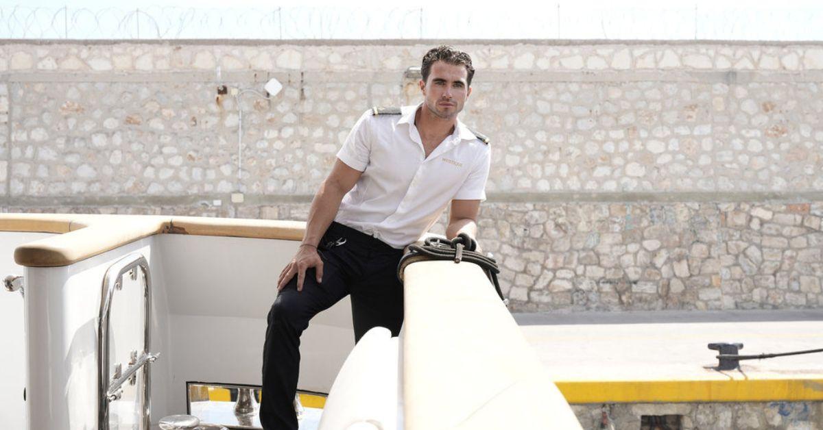 Joe Bradley leans on the railing of the Mustique on 'Below Deck Mediterranean'