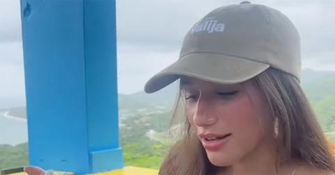 Lauren Sophia eating a meal at an outdoor restaurant.