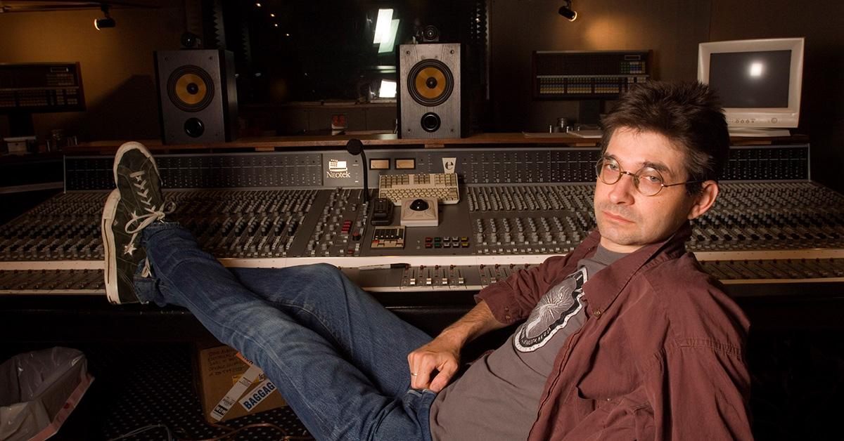 Steve Albini sitting in front of a mixer at his studio. 