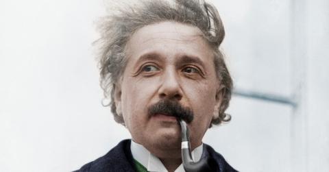 Albert Einstein smoking a pipe