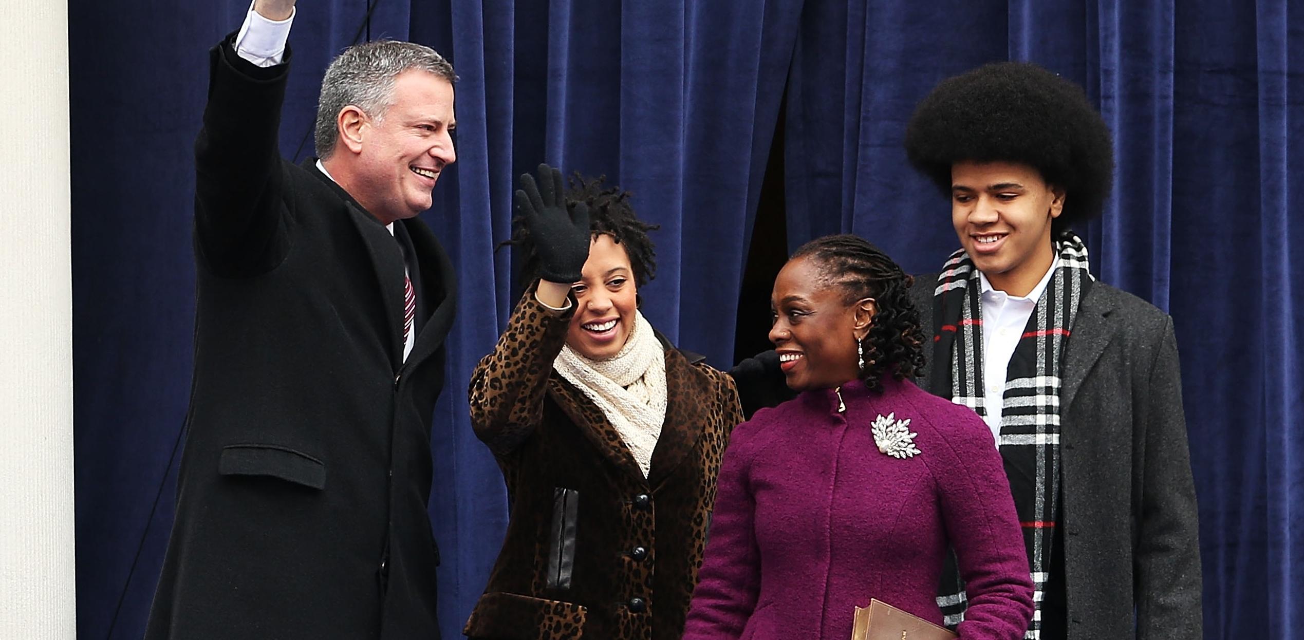 Bill de Blasio walks onto stage with his family Chiara de Blasio (left) Dante de Blasio (right) and wife Chirlane McCray (center)