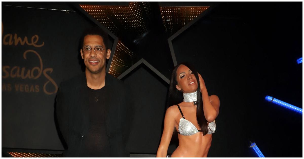 (l-r): Rashad Haughton and a wax figure of Aaliyah