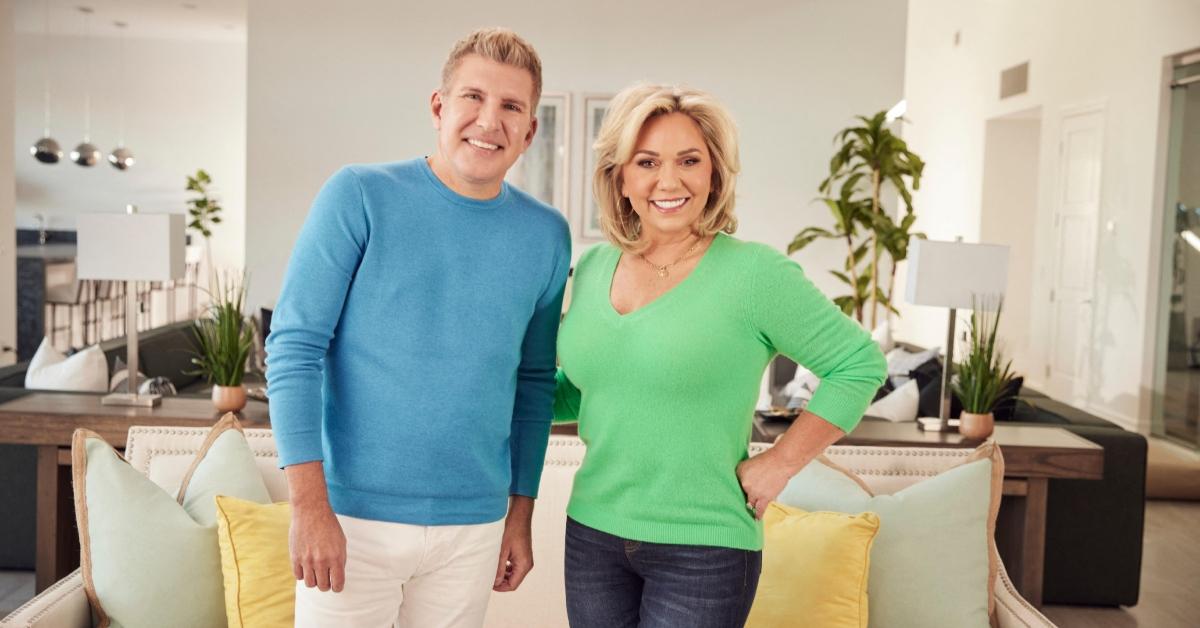 (l-r): Todd and Julie Chrisley posing in a campaign