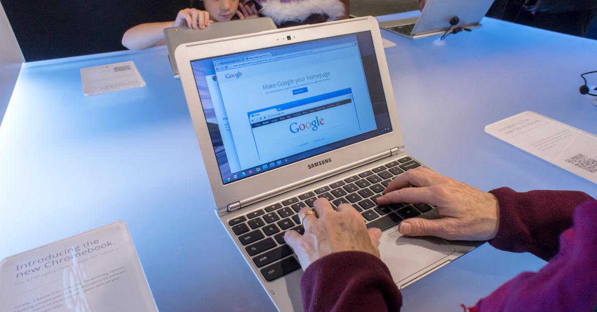 A person typing on a Samsung Chromebook.