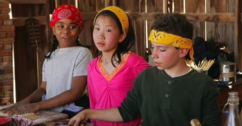 Three kids cooking on 'Kid Nation'