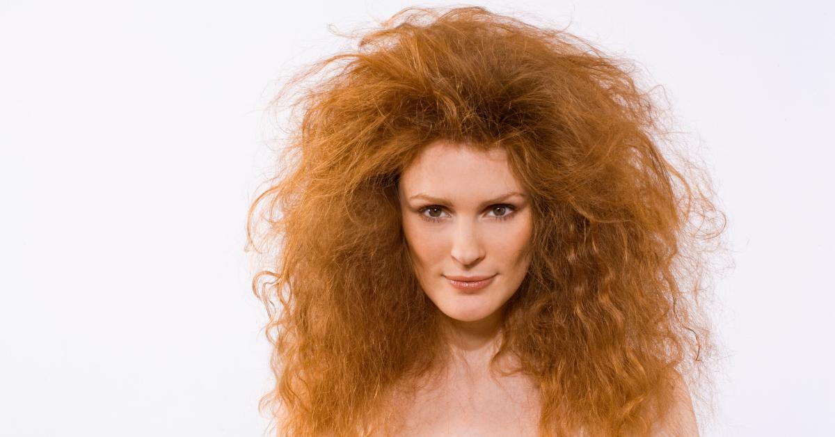 A woman with extremely frizzy hair.