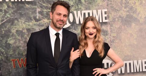 Amanda Seyfried and Thomas Sadoski pose for a photo.