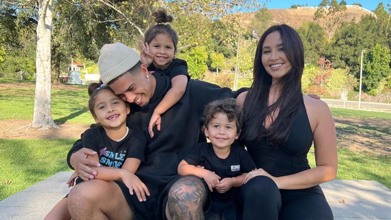 Austin McBroom and Catherine Paiz at a park with their kids 