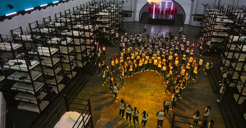 'Squid Game: The Challenge' players gather in the dormitory.