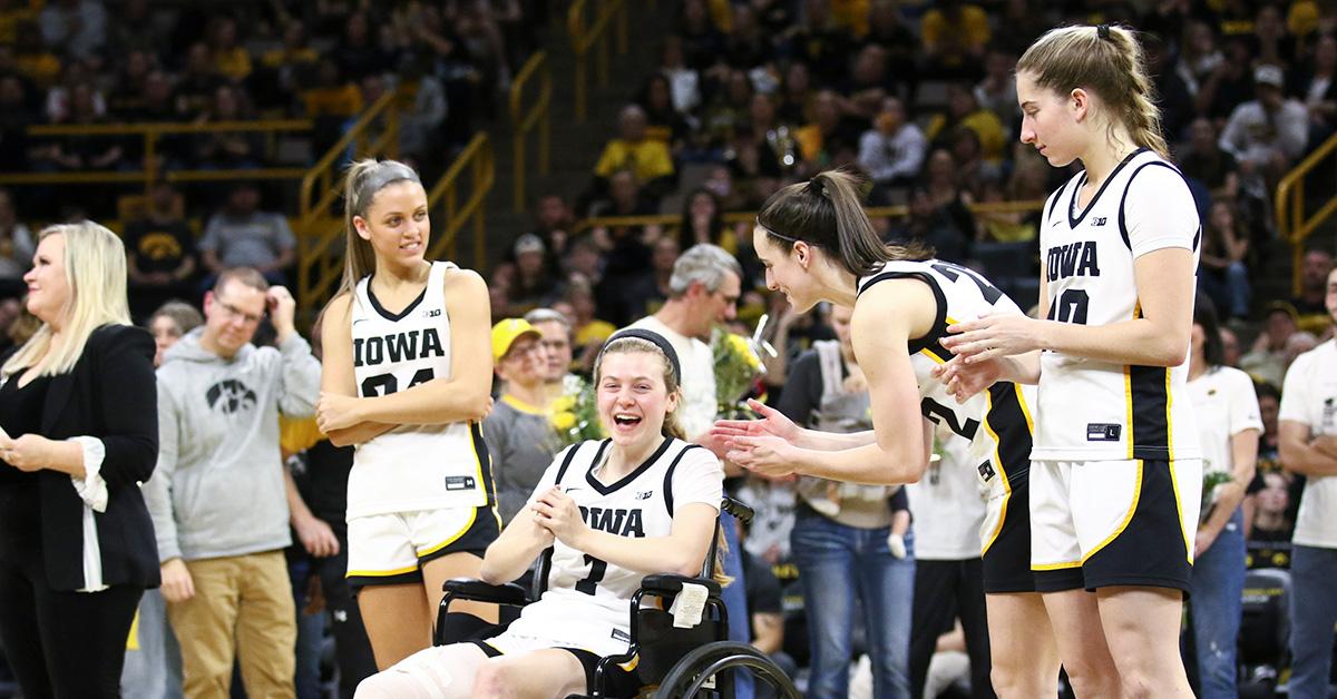 Caitlin Clark talking to Molly Davis following her injury. 