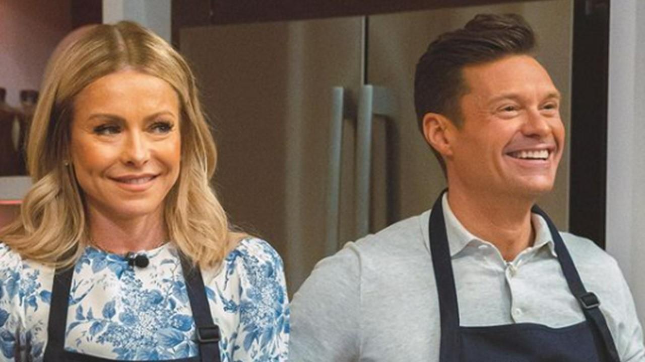 Kelly Ripa and Ryan Seacrest wearing aprons on 'Live With Kelly and Ryan'