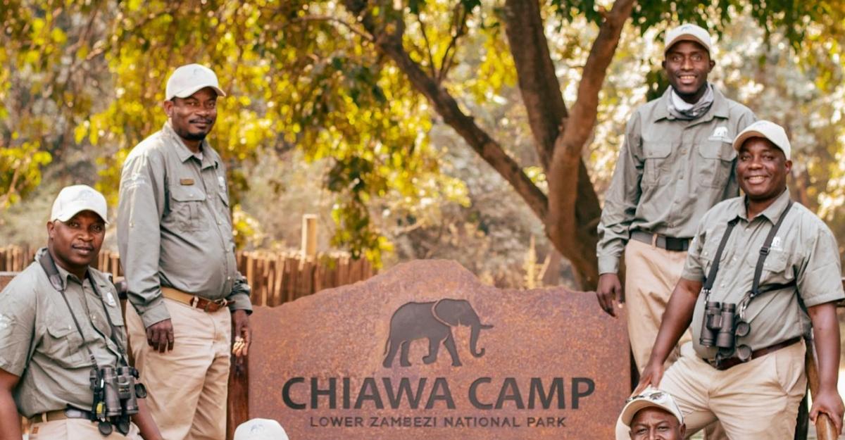 Chiawa Camp tour guides pose for an Instagram photo for Chiawa Safaris