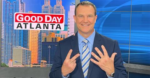 Buck Lanford holding seven fingers up on Good Day Atlanta.