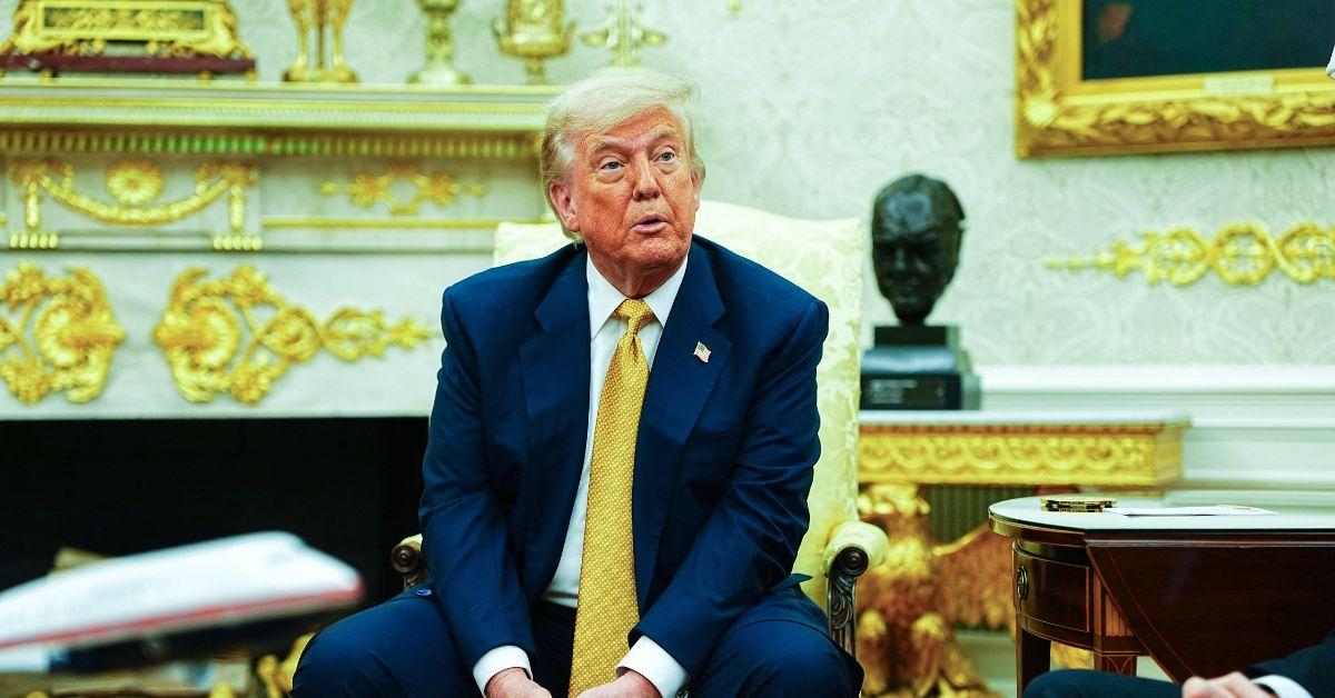 Trump sitting in the Oval Office. 