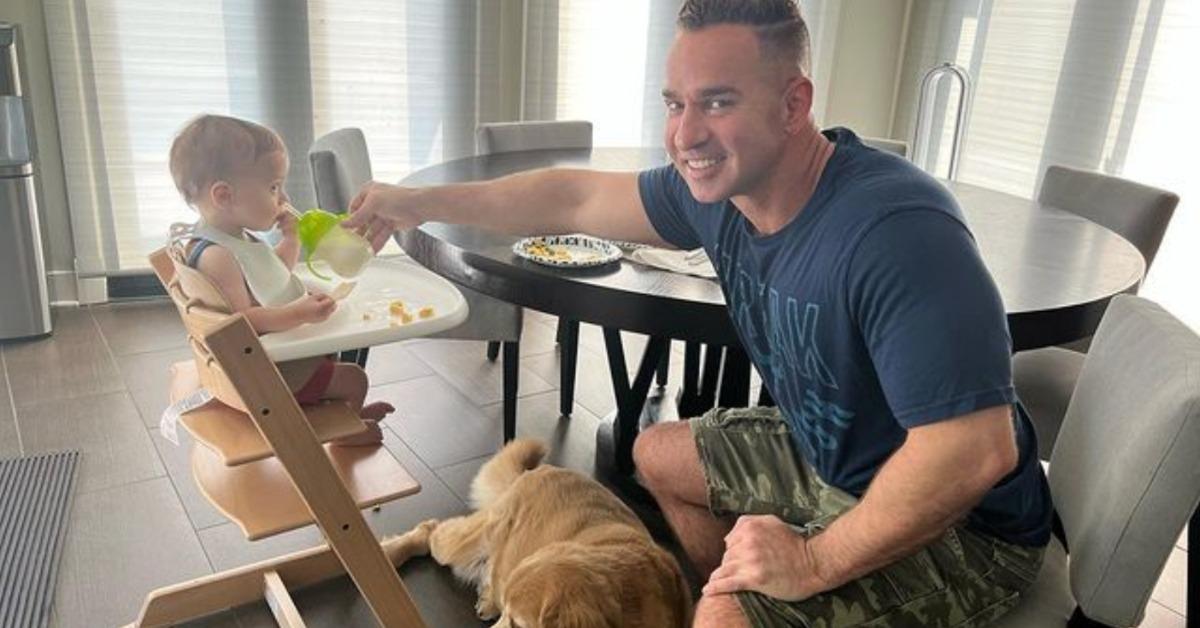 Mike Sorrentino with his dog and his son