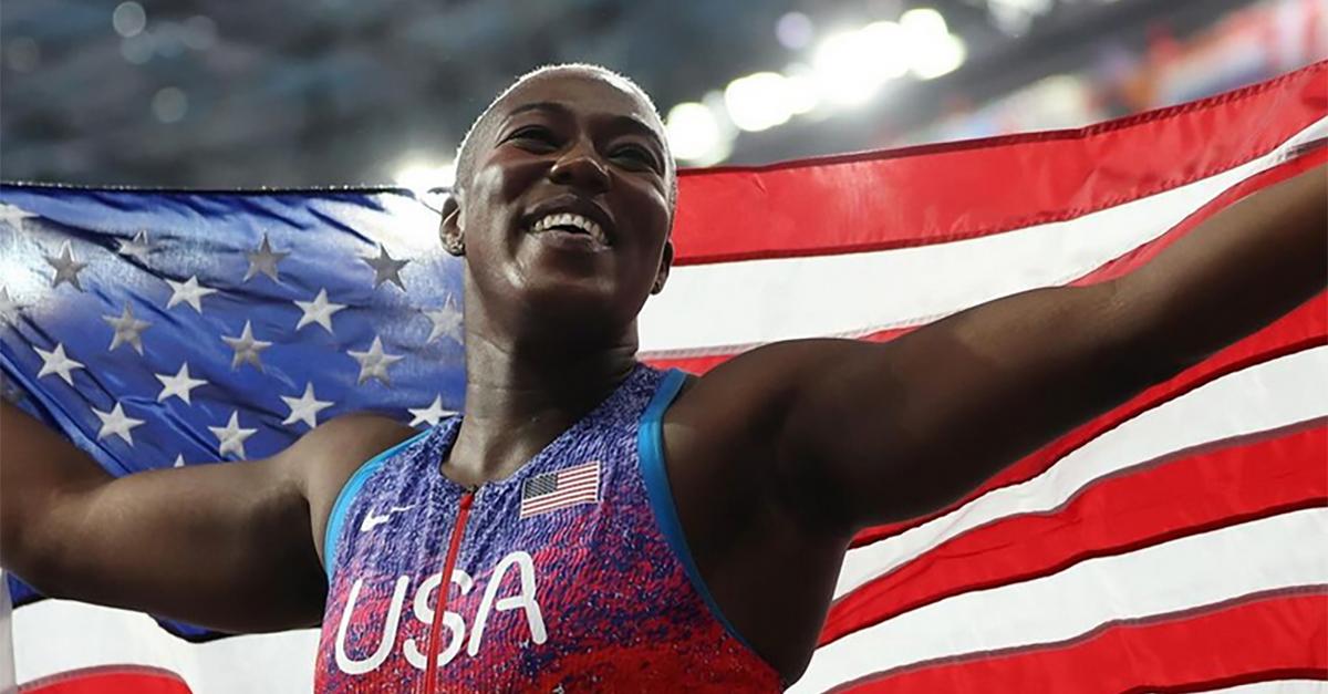 Annette Echikunwoke screams proudly during Olympic hammer throw