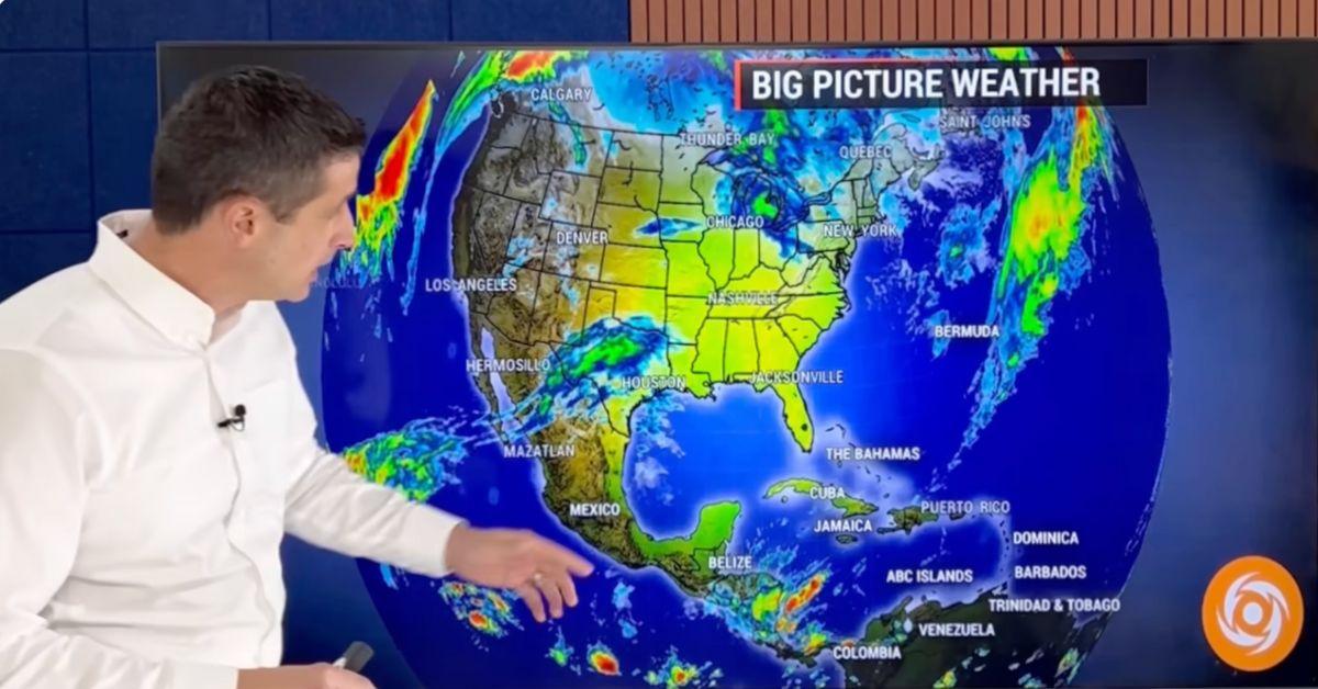 Brian Shields points at a map of the Gulf of Mexico. 