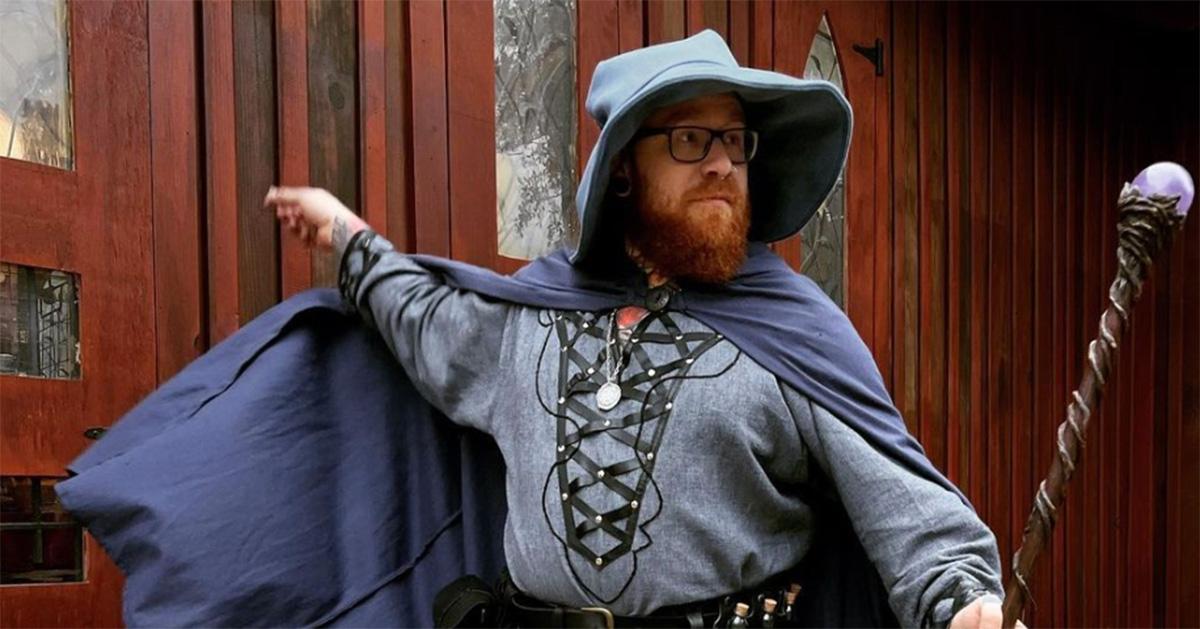 Baddie in a wizard's outfit with a cloak and a staff. 