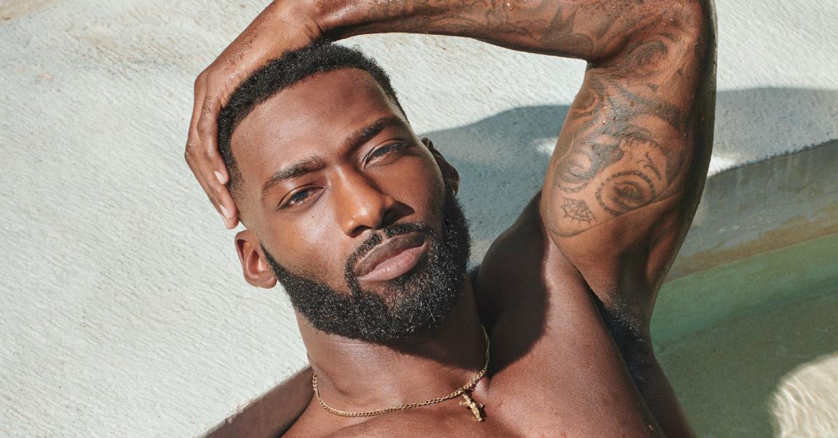 Kaz Bishop poses shirtless in a pool for his official 'Perfect Match' Season 2 portrait.