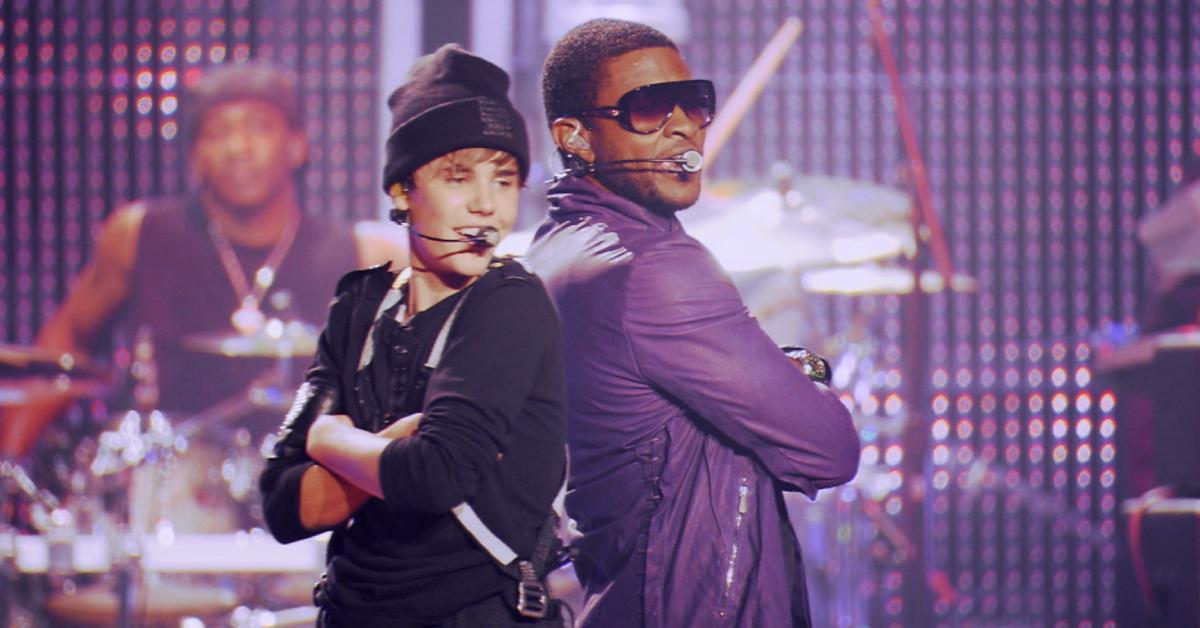 Justin Bieber and Usher performing on stage together in the 'Justin Bieber: Never Say Never' movie.