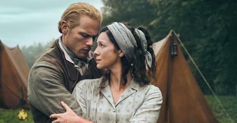 Promotional photo of Caitríona Balfe and Sam Heughan for Season 7 of 'Outlander'