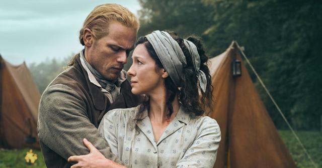 Promotional photo of Caitríona Balfe and Sam Heughan for Season 7 of 'Outlander'