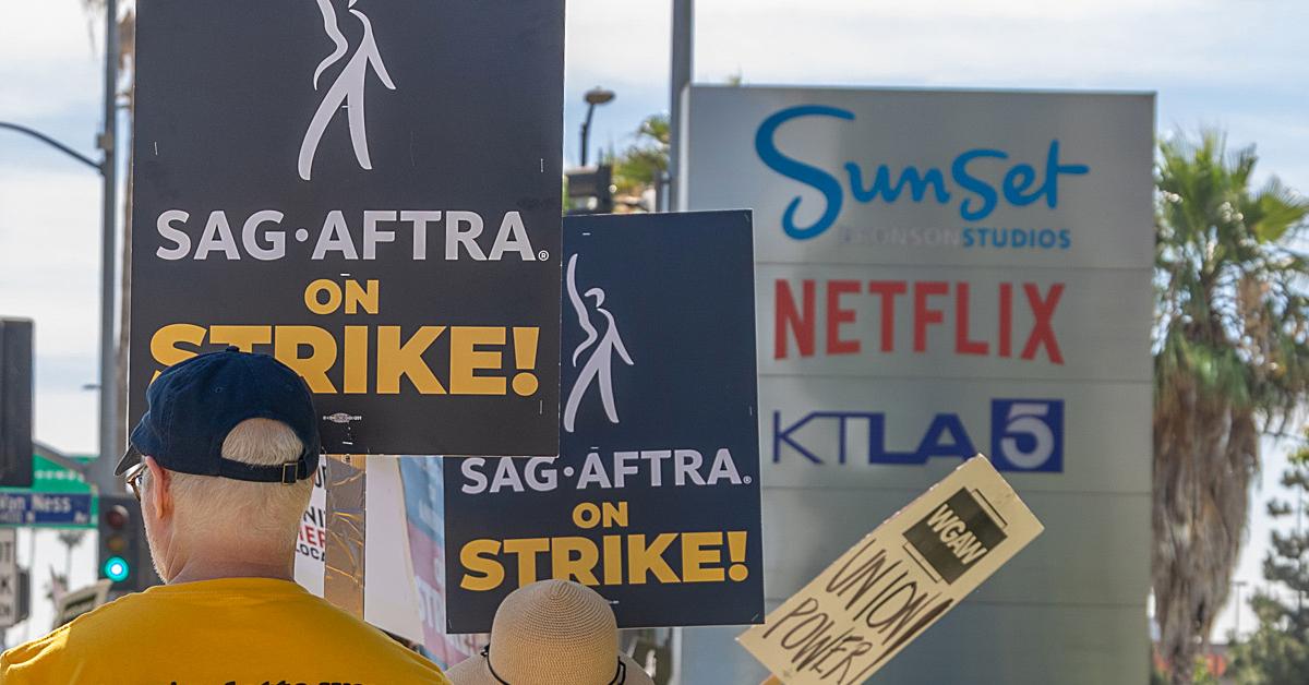 Members of SAG-AFTRA and WGA go on strike at Netflix